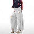 Fun sausage dog embroidery curved knife guard pants