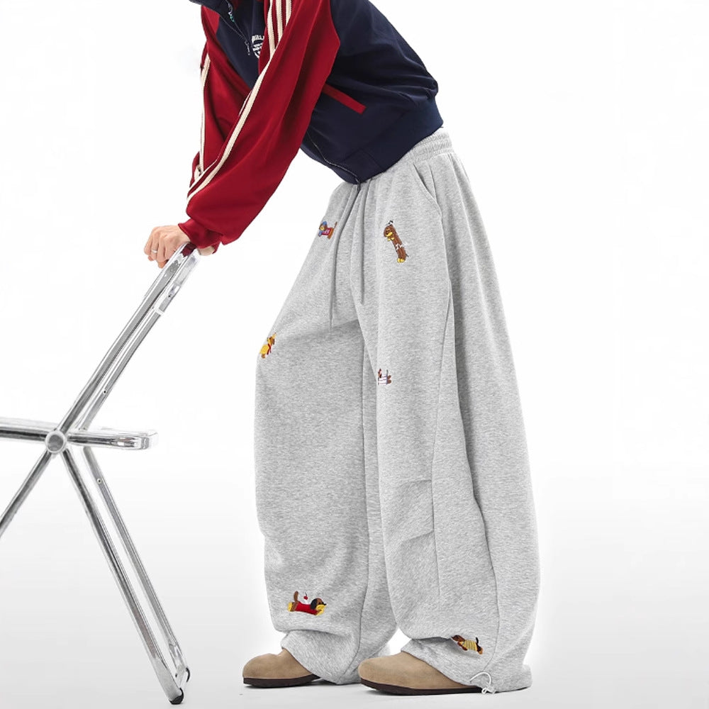 Fun sausage dog embroidery curved knife guard pants